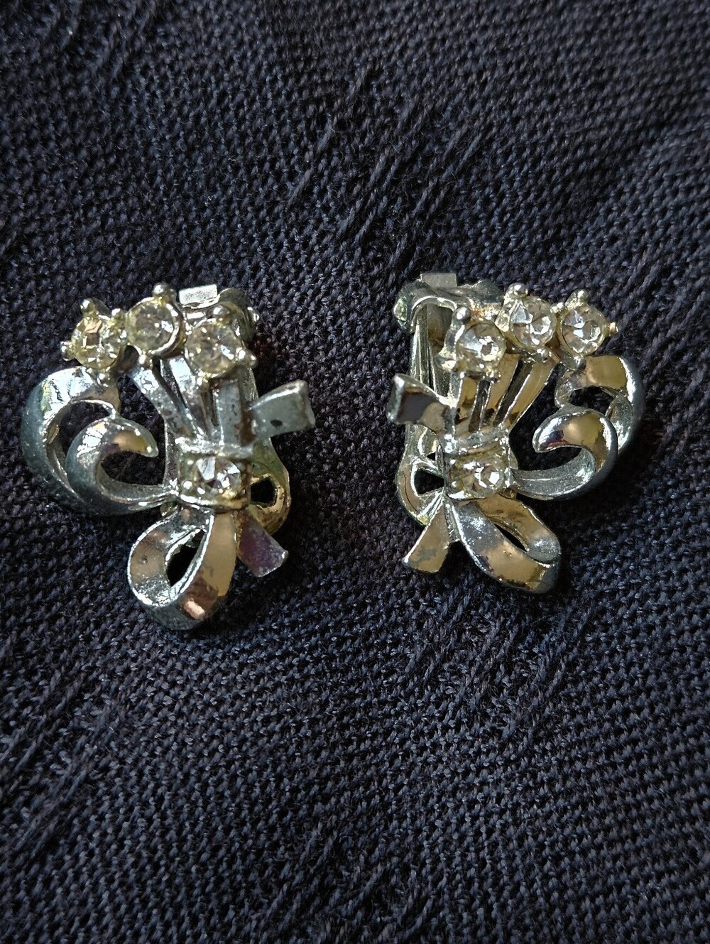 Silver Tone Floral Bow Clip-On Earrings With Crystal Stones.